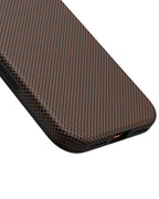 Close up of bottom precision cutouts and corner protection on brown aramid fiber case